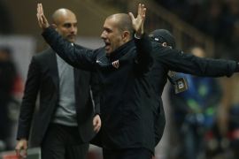 Soccer Football - AS Monaco v Manchester City - UEFA Champions League Round of 16 Second Leg - Stade Louis II, Monaco - 15/3/17 Monaco coach Leonardo Jardim celebrates after the game as Manchester City manager Pep Guardiola looks dejected Action Images via Reuters / Andrew Couldridge Livepic