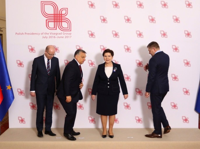 Visegrad Group (V4) member nations' Prime Ministers, Bohuslav Sobotka of the Czech Republic, Hungary's Viktor Orban, Poland's Beata Szydlo and Slovakia's Robert Fico pose for a family photo during a summit in Warsaw, Poland March 28, 2017. Agencja Gazeta/Slawomir Kaminski via REUTERS ATTENTION EDITORS - THIS IMAGE WAS PROVIDED BY A THIRD PARTY. EDITORIAL USE ONLY. POLAND OUT. NO COMMERCIAL OR EDITORIAL SALES IN POLAND.