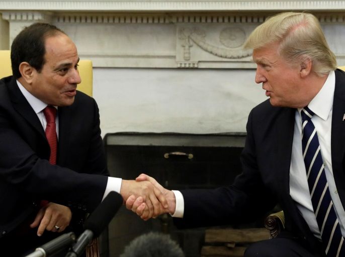U.S. President Donald Trump shakes hands with Egyptian President Abdel Fattah al-Sisi in the Oval Office of the White House in Washington, U.S., April 3, 2017. REUTERS/Kevin Lamarque