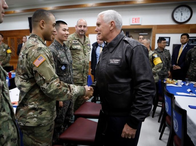 U.S. Vice President Mike Pence shakes hands with U.S. soldier during a meeting with U.S. and South Korean soldiers at Camp Bonifas near the truce village of Panmunjom, in Paju, South Korea, April 17, 2017. REUTERS/Kim Hong-Ji