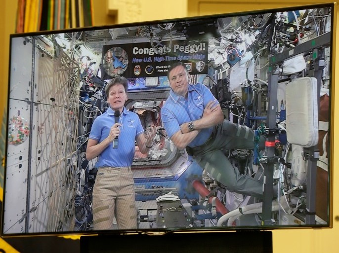 From the International Space Station, Commander Peggy Whitson and Flight Engineer Jack Fischer of NASA speak via video conference to U.S. President Donald Trump at Oval Office of the White House in Washington, U.S., April 24, 2017. REUTERS/Kevin Lamarque