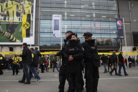 DORTMUND, GERMANY - APRIL 12: Police patrol outside the ground prior to the UEFA Champions League Quarter Final first leg match between Borussia Dortmund and AS Monaco at Signal Iduna Park on April 12, 2017 in Dortmund, Germany. The match was rescheduled after an alleged terrorist attack on the Borussia Dortmund team coach as it made it's way to the stadium. (Photo by Maja Hitij/Bongarts/Getty Images)