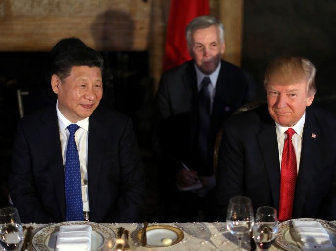 Chinese President Xi Jinping and U.S. President Donald Trump attend a dinner at the start of their summit at Trump's Mar-a-Lago estate in West Palm Beach, Florida, U.S., April 6, 2017. REUTERS/Carlos Barria