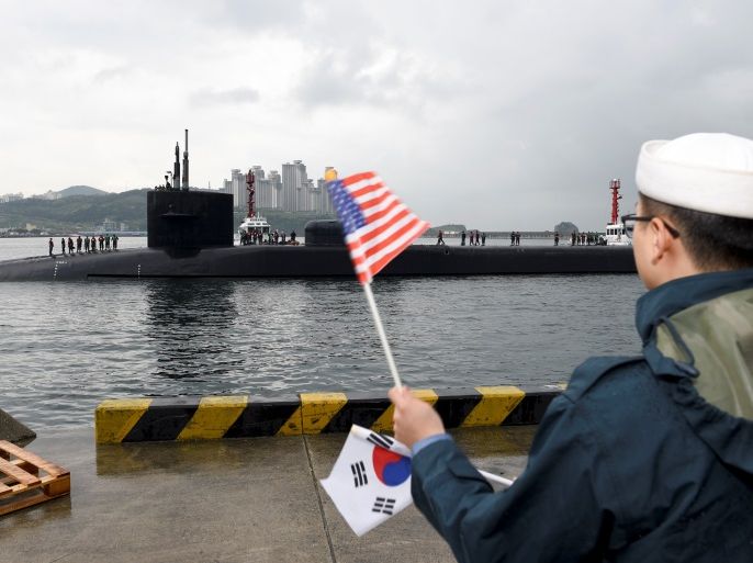 The Ohio-class guided-missile submarine USS Michigan arrives for a regularly scheduled port visit while conducting routine patrols throughout the Western Pacific in Busan, South Korea, April 24, 2017. Jermaine Ralliford/Courtesy U.S. Navy/Handout via REUTERS ATTENTION EDITORS - THIS IMAGE WAS PROVIDED BY A THIRD PARTY. EDITORIAL USE ONLY.