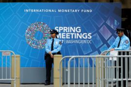 Security officers stand guard outside the International Monetary Fund headquarters building during the IMF/World Bank spring meetings in Washington, U.S., April 21, 2017. REUTERS/Yuri Gripas