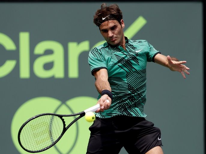Apr 2, 2017; Key Biscayne, FL, USA; Roger Federer of Switzerland hits a forehand against Rafael Nadal of Spain (not pictured) in the men's singles championship of the 2017 Miami Open at Crandon Park Tennis Center. Federer won 6-3, 6-4. Mandatory Credit: Geoff Burke-USA TODAY Sports