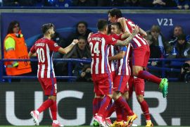 epa05913933 Atletico players celebrate after scoring the opening goal during the UEFA Champions League quarter final second leg match between Leicester City and Atletico Madrid, Leicester, United Kingdom, 18 April 2017. EPA/TIM KEETON
