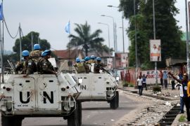 Peacekeepers serving in the United Nations Organization Stabilization Mission in the Democratic Republic of the Congo (MONUSCO) patrol in their armoured personnel carrier during demonstrations against Congolese President Joseph Kabila in the streets of the Democratic Republic of Congo's capital Kinshasa, December 20, 2016. REUTERS/Thomas Mukoya