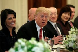 With U.S. Ambassador to the United Nations Nikki Haley at his side (L), U.S. President Donald Trump hosts a working lunch with ambassadors of countries on the UN Security Council at the White House in Washington, U.S., April 24, 2017. REUTERS/Kevin Lamarque