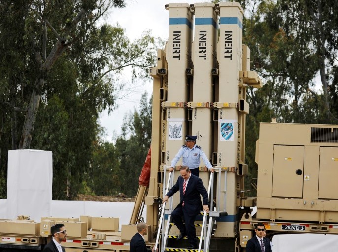 Israeli Prime Minister Benjamin Netanyahu steps off a David's Sling launcher system during a ceremony in which Israel declared its