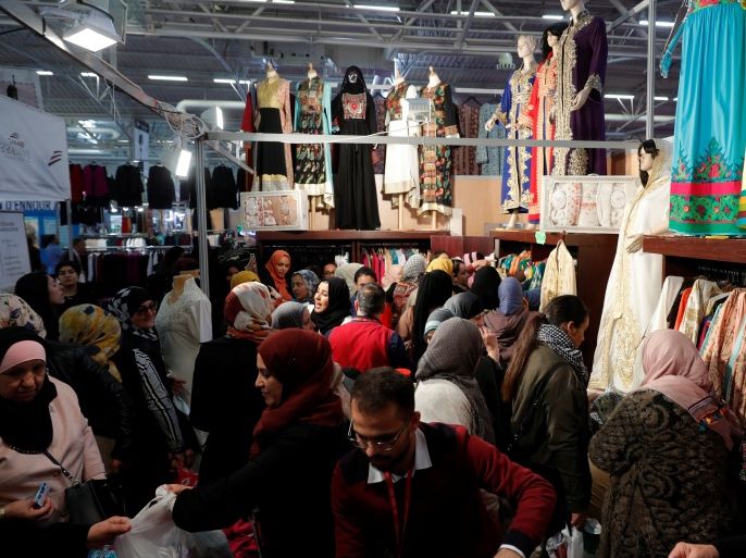 A stand displays women's clothes during the 34th annual meeting of French Muslims, the cultural and festive event organized by the Union of Islamic Organizations of France (UOIF) at Le Bourget, near Paris, April 14, 2017. REUTERS/Philippe Wojazer