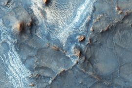 The Nili Fossae region, one of the most colorful regions of the planet Mars located on the northwest rim of Isidis impact basin, is shown in this photo taken February. 5, 2016, by the High Resolution Imaging Science Experiment (HiRISE) camera on NASA's Mars Reconnaissance Orbiter. NASA/JPL-Caltech/University of Arizona/Handout via Reuters ATTENTION EDITORS - THIS IMAGE WAS PROVIDED BY A THIRD PARTY. EDITORIAL USE ONLY