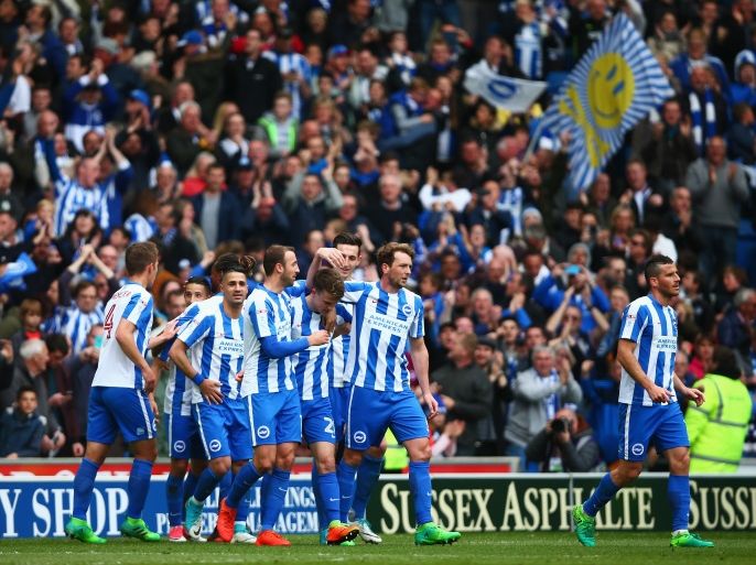 BRIGHTON, ENGLAND - APRIL 17: Solly March of Brighton and Hove Albion celebrates scoring his team's second goal with team mates during the Sky Bet Championship match between Brighton and Hove Albion and Wigan Athletic at Amex Stadium on April 17, 2017 in Brighton, England. (Photo by Dan Istitene/Getty Images)