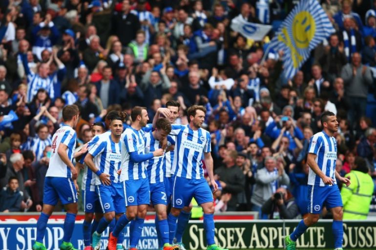 BRIGHTON, ENGLAND - APRIL 17: Solly March of Brighton and Hove Albion celebrates scoring his team's second goal with team mates during the Sky Bet Championship match between Brighton and Hove Albion and Wigan Athletic at Amex Stadium on April 17, 2017 in Brighton, England. (Photo by Dan Istitene/Getty Images)