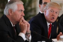 U.S. President Donald Trump (R) speaks next to Secretary of State Rex Tillerson during a bilateral meeting with China's President Xi Jinping (Not Pictured) at Trump's Mar-a-Lago estate in Palm Beach, Florida, U.S., April 7, 2017.