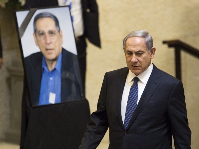 Israel's Prime Minister Benjamin Netanyahu is seen during an annual memorial service for the slain cabinet minister Rehavam Zeevi at the Knesset, Israel's Parliament, in Jerusalem October 13, 2015. With the worst unrest in years in Israel and the Palestinian territories showing no sign of abating, Prime Minister Benjamin Netanyahu convened an emergency meeting of his security cabinet to discuss what police said would be new operational plans. REUTERS/Amir Cohen