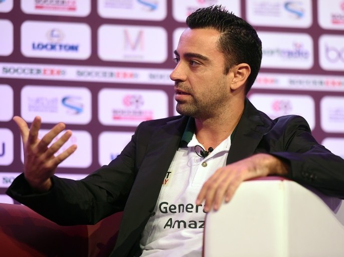 DOHA, QATAR - DECEMBER 05: Generation Amazing Ambassador, Xavi Hernandez speaks on day two of the Soccerex Asia on December 5, 2016 in Doha, Qatar. (Photo by Tom Dulat/Getty Images)
