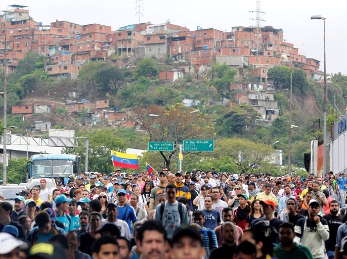 Demonstrators rally against Venezuela's President Nicolas Maduro in Caracas, Venezuela, April 13, 2017. REUTERS/Christian Veron