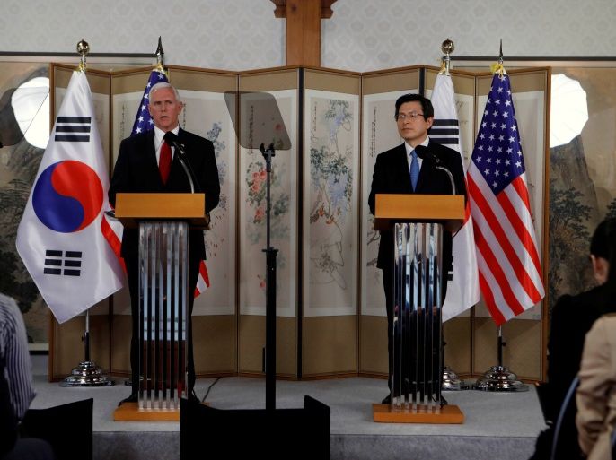U.S. Vice President Mike Pence speaks beside acting South Korean President and Prime Minister Hwang Kyo-ahn during a news conference in Seoul, South Korea, April 17, 2017. REUTERS/Kim Hong-Ji