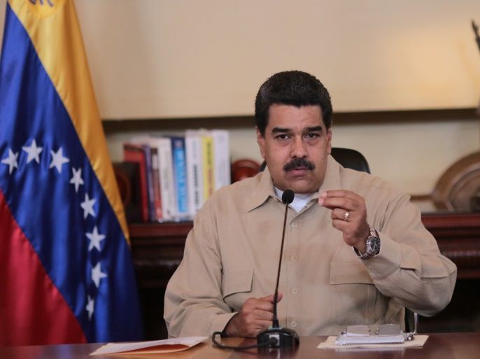 Venezuela's President Nicolas Maduro speaks during a meeting with ministers and members of the military high command at the Miraflores Palace in Caracas, Venezuela April 18, 2017. Miraflores Palace/Handout via REUTERS ATTENTION EDITORS - THIS PICTURE WAS PROVIDED BY A THIRD PARTY. EDITORIAL USE ONLY.
