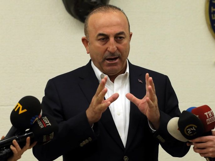 Turkish Foreign Minister Mevlut Cavusoglu speaks during a news conference at Ataturk International airport in Istanbul, Turkey, March 11, 2017. REUTERS/Huseyin Aldemir