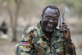 South Sudan's rebel leader Riek Machar talks on the phone in his field office in a rebel-controlled territory in Jonglei State, South Sudan, February 1, 2014. REUTERS/Goran Tomasevic/File Photo TPX IMAGES OF THE DAY