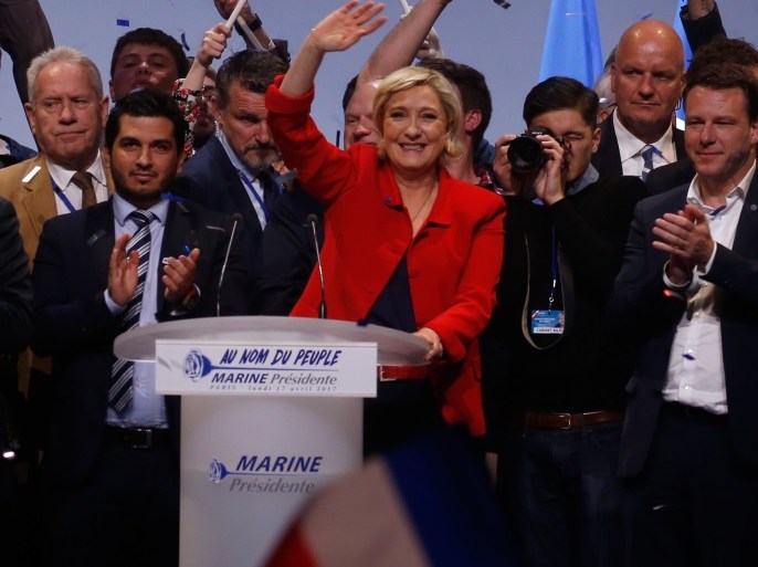 Marine Le Pen, French National Front (FN) political party leader and candidate for French 2017 presidential election, reacts at the end of her campaign rally in Paris, France, April 17, 2017. REUTERS/Pascal Rossignol