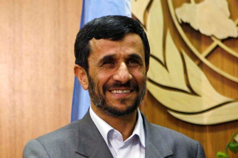 File Photo - Iranian President Mahmoud Ahmadinejad smiles as he meets with United Nations Secretary-General Ban Ki-moon at the United Nations in New York September 24, 2007. REUTERS/Eric Thayer/File Photo
