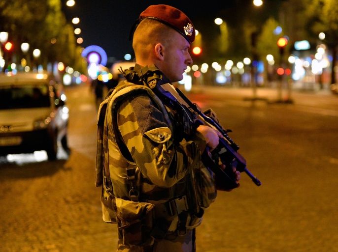 PARIS, FRANCE - APRIL 20: French military secure the area after a gunman opened fire on the Champs Elysees on April 20, 2017 in Paris, France. One police officer was killed and another injured in the shooting. Security is heightened in Paris with the first round of France's presidential election on Sunday. (Photo by Aurelien Meunier/Getty Images)