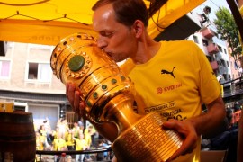 Coach Thomas Tuchel of Borussia Dortmund celebrates with team German Soccer Cup Final victory v Frankfurt on their return to Dortmund, Germany, May 28, 2017. REUTERS/Ina Fassbender/POOL