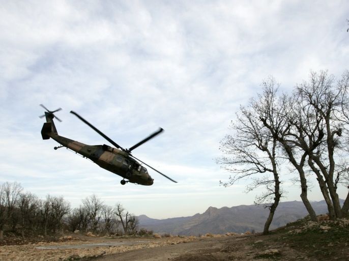 A Turkish army helicopter takes off from a military base situated 20 km (12 miles) south of Turkish city of Sirnak December 7, 2008. REUTERS/Umit Bektas (TURKEY)