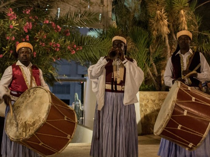 DJERBA, TUNISIA - JUNE 30: A tourist watches on during a traditional dance performance at a restaurant on June 30, 2016 in Djerba, Tunisia. Before the 2011 revolution, tourism in Tunisia accounted for approximately 7% of the countries GDP. The two 2015 terrorist attacks at the Bardo Museum and Sousse Beach saw tourism numbers plummet even further forcing hotels to close and many tourism and hospitality workers to lose their jobs. (Photo by Chris McGrath/Getty Images)