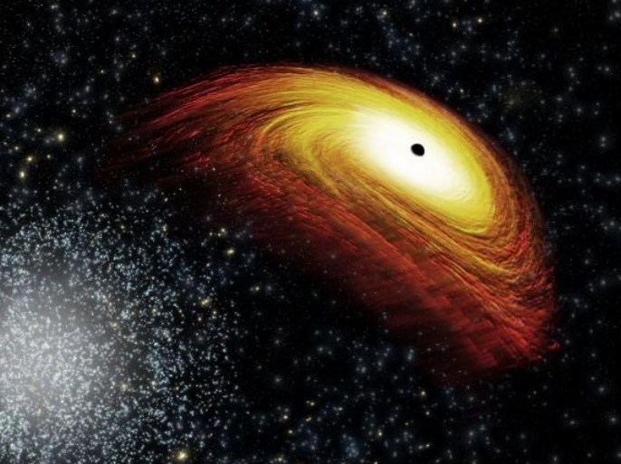 using data from Chandra and other telescopes, astronomers have found a possible "recoiling" black hole. Credit: NASA/CXC/M.Weiss