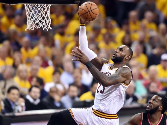 May 1, 2017; Cleveland, OH, USA; Cleveland Cavaliers forward LeBron James (23) drives to the basket against Toronto Raptors forward DeMarre Carroll (5) during the first quarter in game one of the second round of the 2017 NBA Playoffs at Quicken Loans Arena. Mandatory Credit: Ken Blaze-USA TODAY Sports