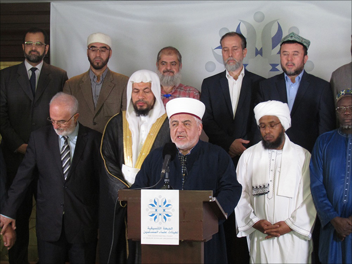حمدي أرسلان ممثل علماء تركيا خلال المؤتمر الصحفي للإعلان عن تأسيس الجبهة التنسيقية (الجزيرة)