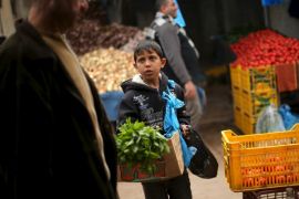 Palestinian boy Mohammad al-Bana, 10, sells mints at a market in Gaza City March 29, 2016. Bana, whose father is unemployed, earns around 10 Shekels ($2.5) per day. The boy starts working after finishing school. He hopes to continue education and become an engineer in the future. REUTERS/Mohammed Salem SEARCH