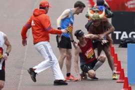 Britain Athletics - London Marathon - London - 23/4/17 A runner collapses just before reaching the finish line Action Images via Reuters / Matthew Childs Livepic