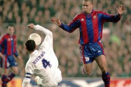 epa02583155 (FILE) A file picture dated 30 January 1997 shows Real Madrid's Fernando Hierro (L) in action against FC Barcelona's Ronaldo (R) during their Spanish King's Cup soccer match in Barcelona, Spain. Three-time world footballer of the year Ronaldo announced on 14 February 2011 he was quitting the game. The 34-year-old Brazilian striker for Sao Paulo's Corinthians confirmed his retirement at a news conference. In an 18-year-career, Ronaldo won two World Cups in which he broke the record for most goals scored in the tournament. Ronaldo played 97 caps for Brazil, scoring 62 goals. His club career included spells in Europe at PSV Eindhoven, Barcelona, Inter Milan, Real Madrid and AC Milan before he returned in 2009 to Brazil to play for Corinthians. EPA/LLUIS GENE
