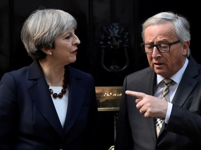 Britain's Prime Minister Theresa May welcomes Head of the European Commission, President Jean-Claude Juncker to Downing Street in London, Britain April 26, 2017. REUTERS/Hannah McKay