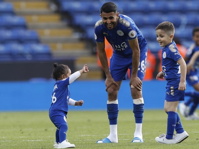 Britain Football Soccer - Leicester City v AFC Bournemouth - Premier League - King Power Stadium - 21/5/17 Leicester City's Riyad Mahrez with his family on the pitch after the match Reuters / Darren Staples Livepic EDITORIAL USE ONLY. No use with unauthorized audio, video, data, fixture lists, club/league logos or