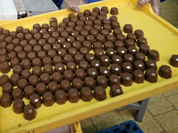 An Egyptian worker works at a local chocolate factory in Cairo, Egypt, February 5, 2017. Picture taken February 5, 2017. REUTERS/Mohamed Abd El Ghany