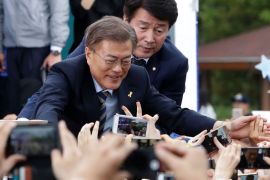 GOYANG, SOUTH KOREA - MAY 04: South Korean presidential candidate Moon Jae-in of the Democratic Party of Korea, is greeted by his supporters during a presidential election campaign on May 4, 2017 in Goyang, South Korea. Preliminary voting has started at local polling stations across South Korea prior to the primary Presidential election on May 9. (Photo by Chung Sung-Jun/Getty Images)