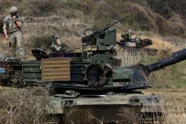PAJU, SOUTH KOREA - APRIL 15: US soldiers prepare for a military exercise near the border between South and North Korea on April 15, 2017 in Paju, South Korea. North Korea celebrated the birthday of its founder Kim Il Sung on April 15 amid the high political tension on the Korean Peninsula and their allies. (Photo by Chung Sung-Jun/Getty Images)