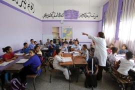 Schoolchildren listen to a teacher as they study during a class in the Oudaya primary school in Rabat, September 15, 2015, at the start of the new school year in Morocco. Nearly three years after Taliban gunmen shot Pakistani schoolgirl Malala Yousafzai, the teenage activist last week urged world leaders gathered in New York to help millions more children go to school. World Teachers' Day falls on 5 October, a Unesco initiative highlighting the work of educators struggling to teach children amid intimidation in Pakistan, conflict in Syria or poverty in Vietnam. Even so, there have been some improvements: the number of children not attending primary school has plummeted to an estimated 57 million worldwide in 2015, the U.N. says, down from 100 million 15 years ago. Reuters photographers have documented learning around the world, from well-resourced schools to pupils crammed into corridors in the Philippines, on boats in Brazil or in crowded classrooms in Burundi. REUTERS/Youssef BoudlalPICTURE 40 OF 47 FOR WIDER IMAGE STORY