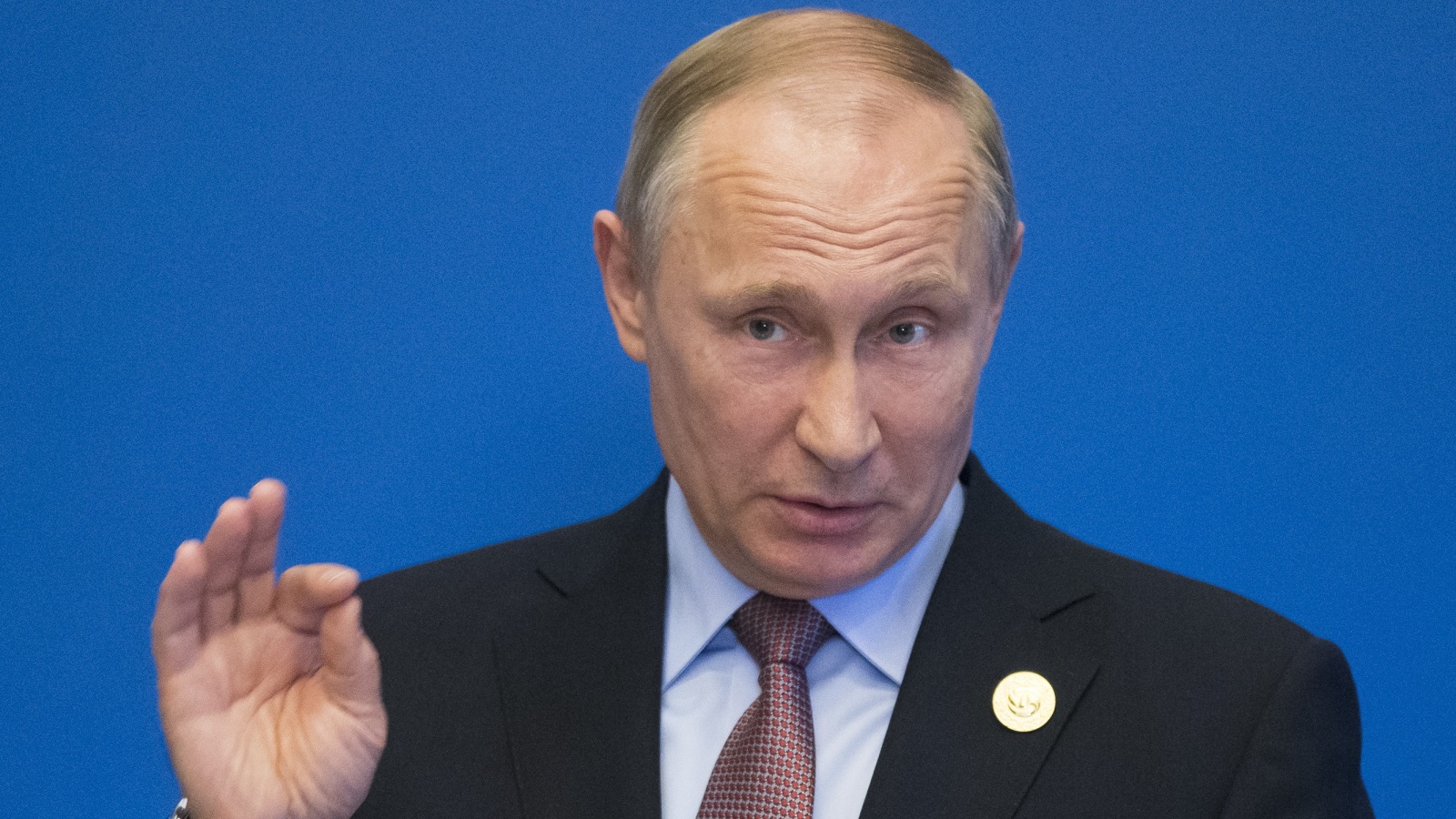 ‪فلاديمير بوتين أكد أن بلاده ليست لها أية علاقة بفيروس 