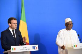 epa05974203 French President Emmanuel Macron (L) holds a press conference with Mali's President Ibrahim Boubacar Keita (R) during a visit to the troops of France's Barkhane counter-terrorism operation in Africa's Sahel region in Gao, northern Mali, 19 May 2017. The French President's visit in Mali is his first trip outside Europe since his inauguration on 14 May 2017. EPA/CHRISTOPHE PETIT TESSON / POOL MAXPPP OUT