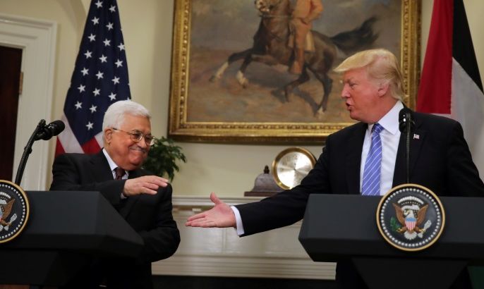 U.S. President Donald Trump shakes hands with Palestinian President Mahmoud Abbas as they deliver a statement at the White House in Washington D.C., U.S., May 3, 2017. REUTERS/Carlos Barria