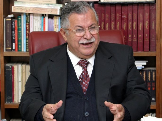 The Kurd leader and presidential candidate Jalal Talabani, speaks to a reporter during an interview held in his office in the Kurdish city of Arbil, February 13, 2005. The Kurdish alliance came second in Iraq's first national election since Saddam Hussein's overthrow with 25 percent the Electoral Commission said on Sunday. REUTERS/Namir Noor-Eldeen HH/WS
