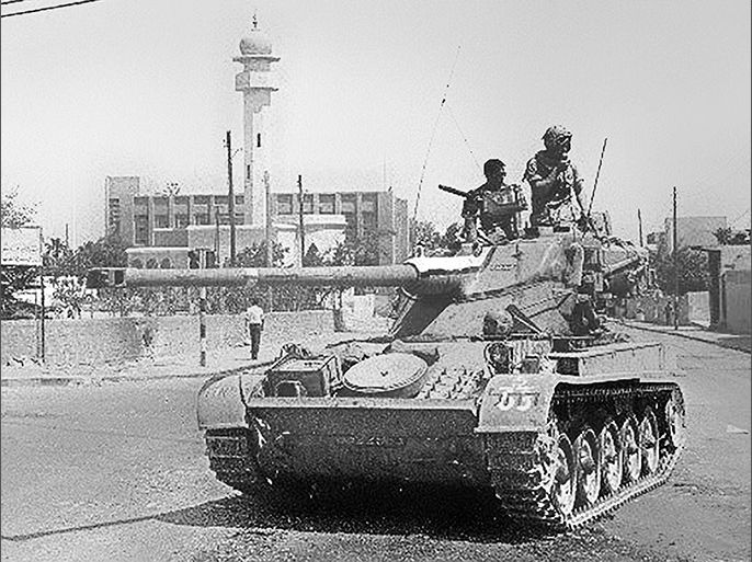 (FILES) An Israeli tank patrols near a mosque in this photo taken in June 1967. Thirty years after the six-day war, new revelations show that Israeli generals exerted considerable pressure to push their government to go into battle. According to military historian Ami Gluska of the Hebrew University in Jerusalem, "a gap separated government officials from soldiers who were on average more than 20 years younger and who were burning to go to war". Eds note: Photo available only in black and white.