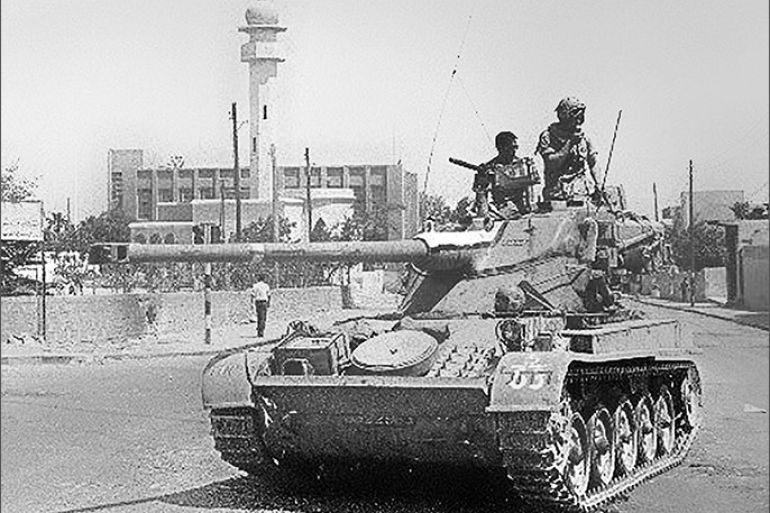 (FILES) An Israeli tank patrols near a mosque in this photo taken in June 1967. Thirty years after the six-day war, new revelations show that Israeli generals exerted considerable pressure to push their government to go into battle. According to military historian Ami Gluska of the Hebrew University in Jerusalem, "a gap separated government officials from soldiers who were on average more than 20 years younger and who were burning to go to war". Eds note: Photo available only in black and white.